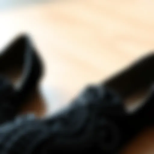 Elegant black velvet flats showcasing intricate design patterns