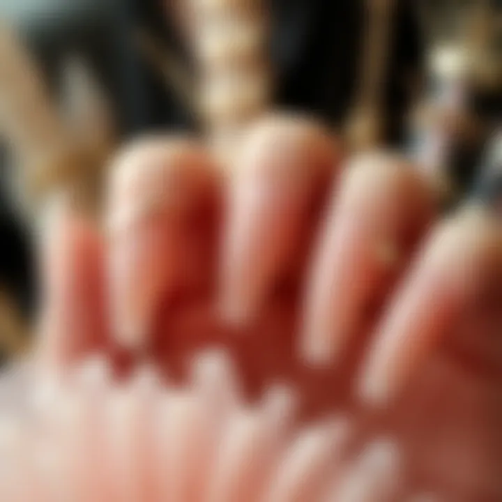 Close-up of coffin shape stick-on nails in a stylish arrangement