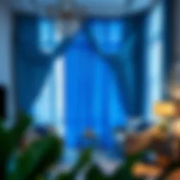 Elegant blue foil curtain draping in a modern living room