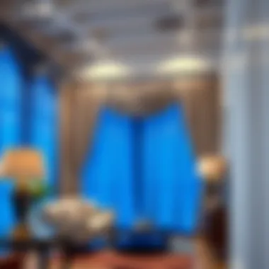 Variety of blue foil curtain styles displayed in an elegant showroom