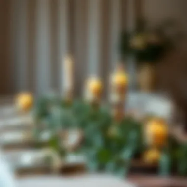 Sophisticated table setting with eucalyptus accents and candles.