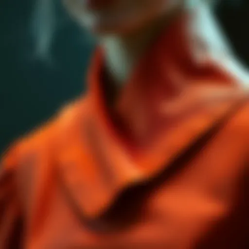 A close-up view of an asymmetrical collar design showcasing its unique shape and details.