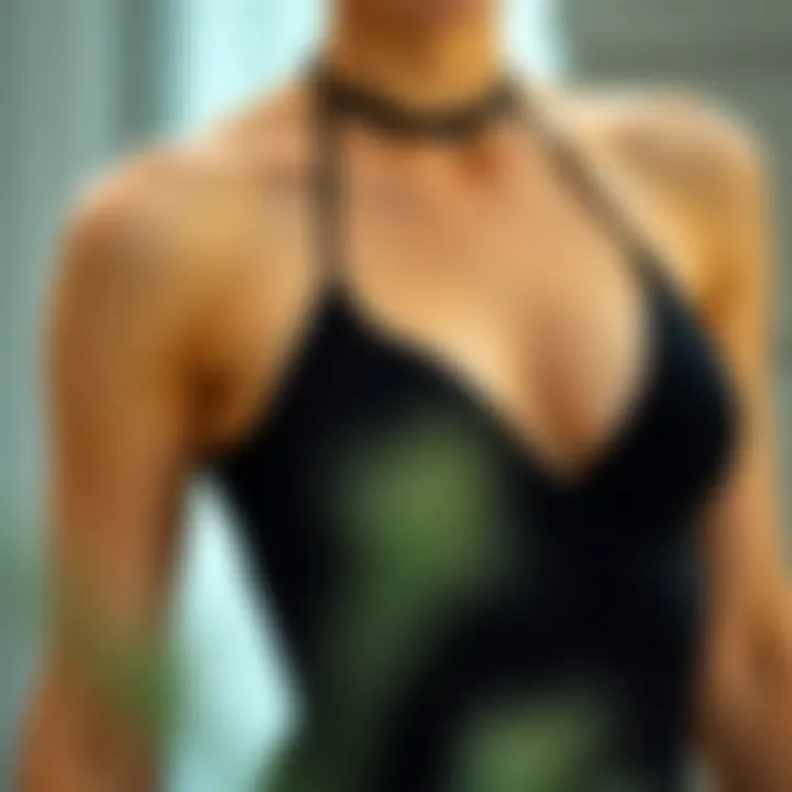 Elegant black halter top bodysuit showcasing its design details