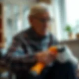 A senior using a long reach grabber to pick up items