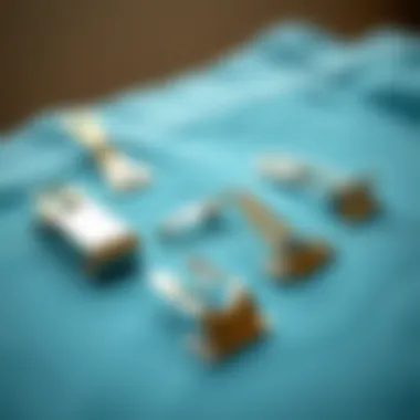 Different Types of Hemming Clips A detailed view of various hemming clips arranged on a fabric swatch.