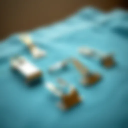 Different Types of Hemming Clips A detailed view of various hemming clips arranged on a fabric swatch.