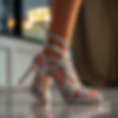 Close-up of strappy silver heels showcasing intricate design