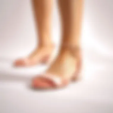 Elegant rose pink sandals displayed on a minimalist background