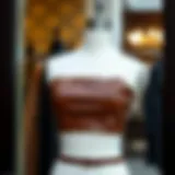 Elegant brown leather strapless top displayed on a mannequin