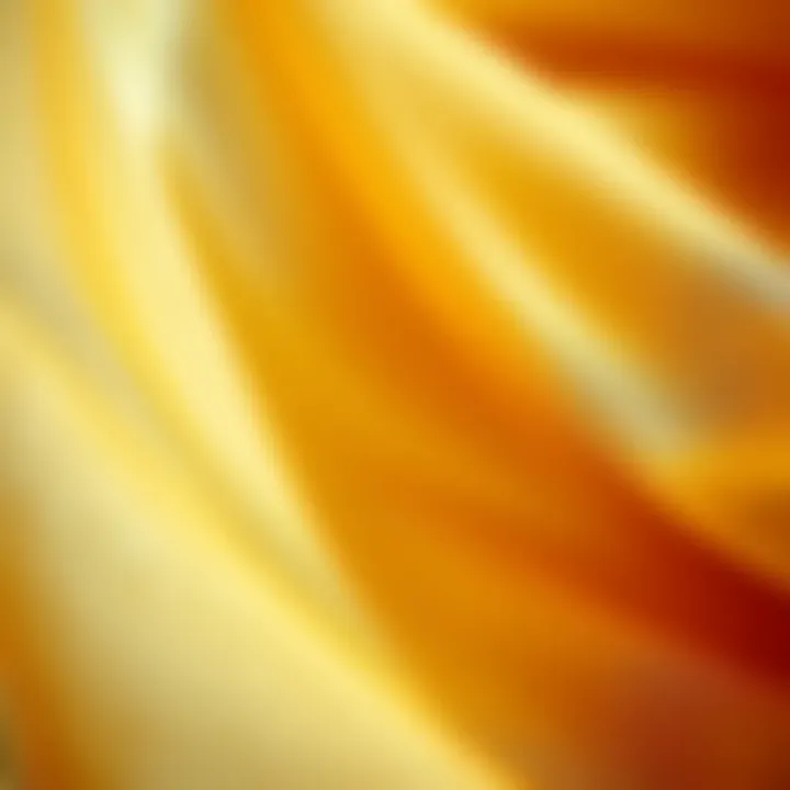 Close-up of gold organza fabric highlighting its shimmering quality