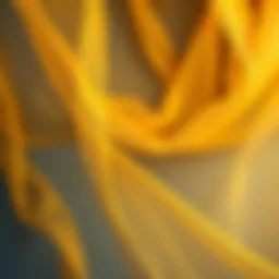 Elegant draping of a gold organza shawl showcasing its sheer texture