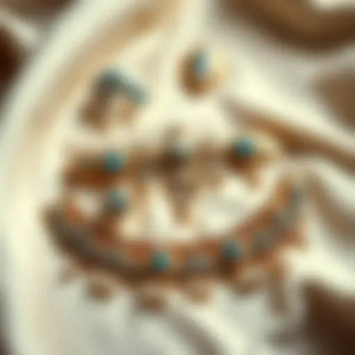 Elegant thigh body jewelry displayed on a soft fabric background.