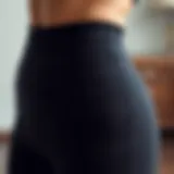 Close-up of the waistband of tummy control yoga pants showcasing the design