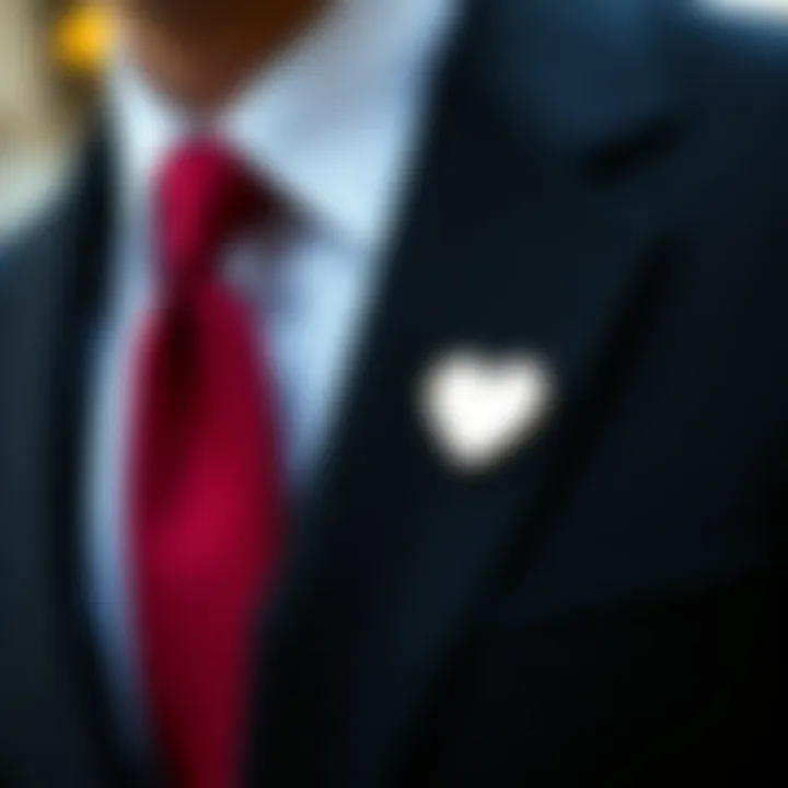 Heart shaped lapel pin worn on a tailored suit jacket