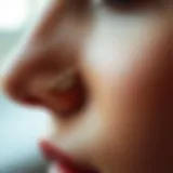 Close-up of a hypoallergenic nose piercing in a unique design