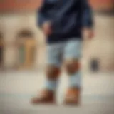 Infant wearing stylish pants with knee pads