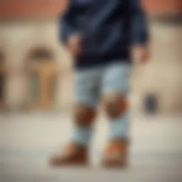 Infant wearing stylish pants with knee pads