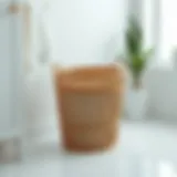 A modern low profile laundry basket in a minimalistic setting