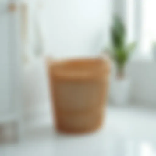 A modern low profile laundry basket in a minimalistic setting