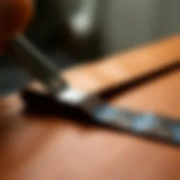 Close-up view of match and patch leather repair tape application