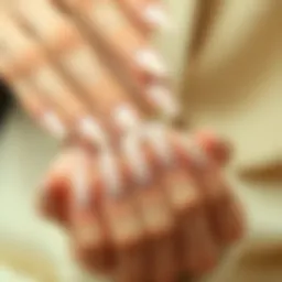 Elegant display of nude acrylic nails showcasing various shades and finishes