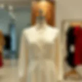 Elegant long white blouse on a mannequin showcasing its design
