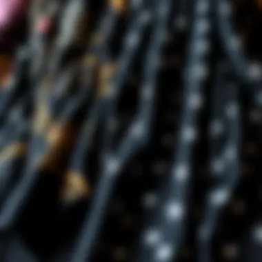 Various fabric choices for black printed scarves displayed together