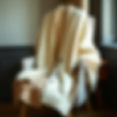 Elegant oversized cream cardigan draped stylishly over a chair