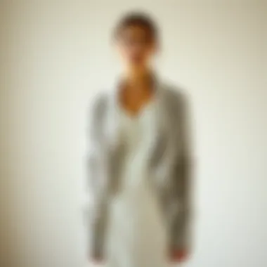 Effortlessly Chic: The Cardigan and Dress Ensemble A minimalist styled outfit featuring a plain cardigan draped elegantly over a simple dress.