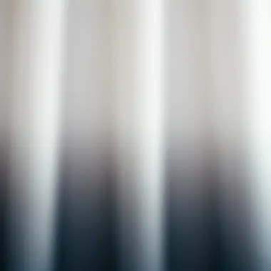 Close-up of the texture and gradient of a grey ombre shower curtain