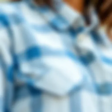 Close-up of a white and blue plaid shirt highlighting the fabric texture and design.